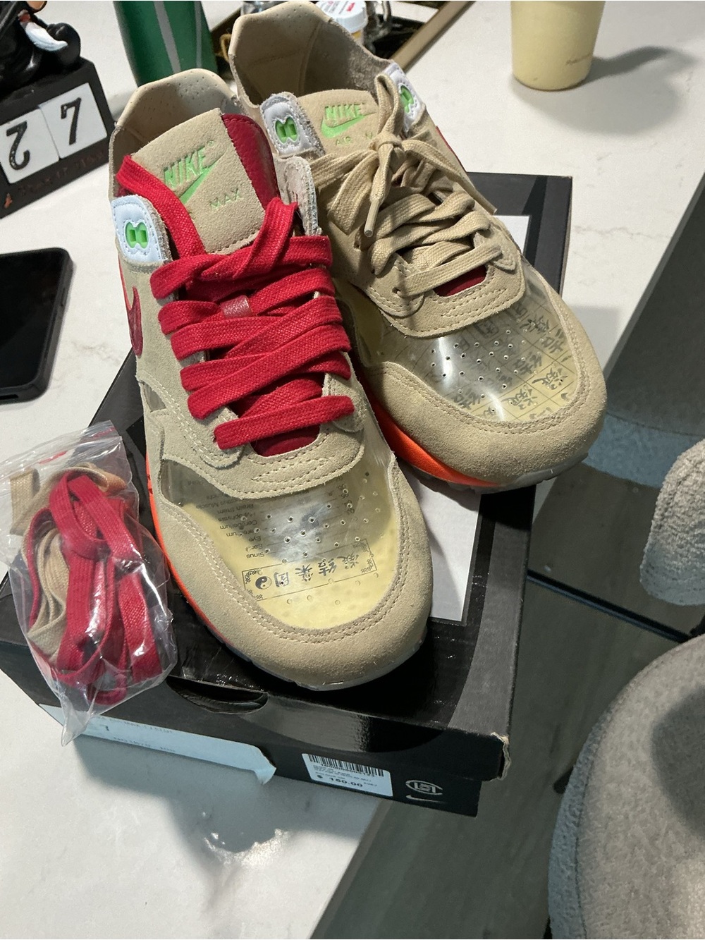 Nike Kids Tan Sneakers with Red Accents